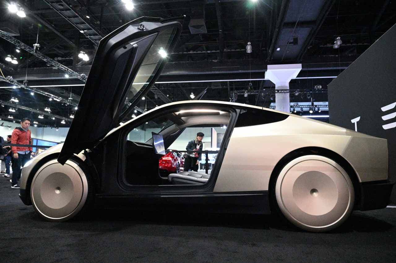 Tesla’s stock jumps as the company gets ready for a robotaxi push
